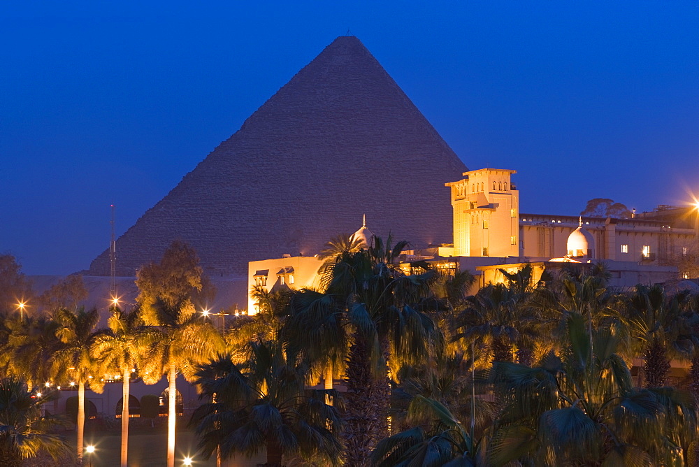 The Great Pyramid , UNESCO World Heritage Site, and the Mena House Hotel in Giza at night, near Cairo, Egypt, North Africa, Africa