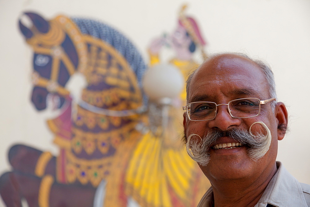 Guard with fine curly moustache, City Palace, Udaipur, Rajasthan, India, Asia