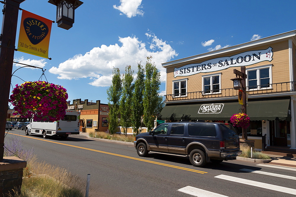 Cars in a traditional street in the historic City of Sisters in Deschutes County, Oregon, United States of America, North America