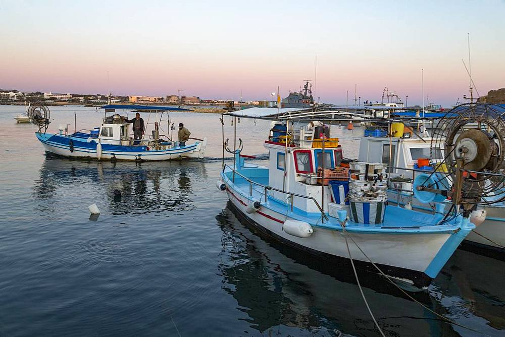 Traditional fishing boats moored in Paphos harbour in southern Cyprus at dusk, Cyprus, Mediterranean, Europe