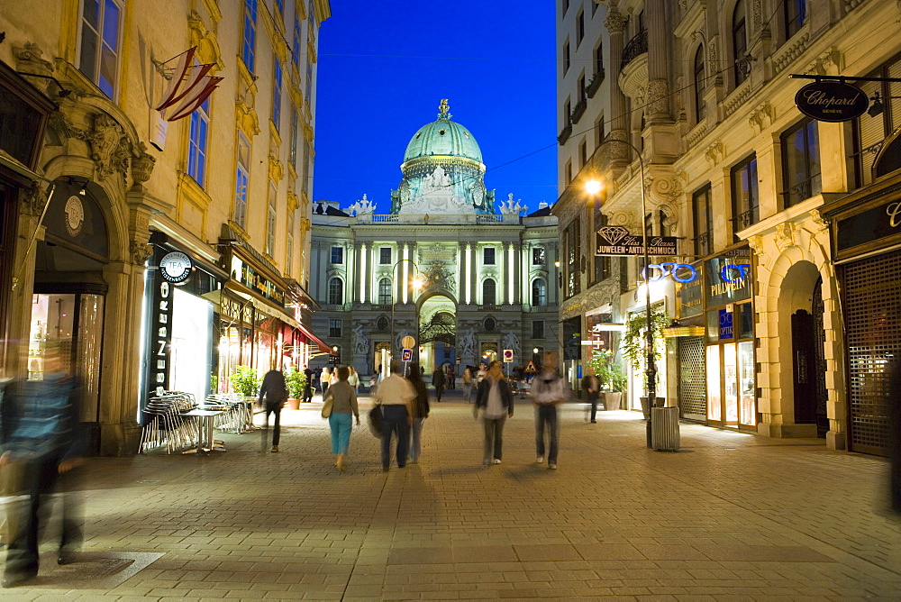 Kohlmarkt Street with Hofburg Complex in distance in evening light, Vienna, Austria, Europe