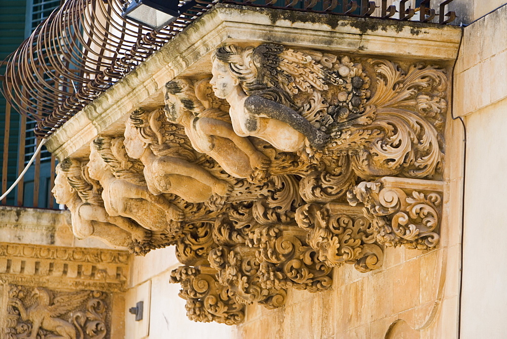 Baroque balcony, Palazzo Nicolaci, Noto, Sicily, Italy, Europe