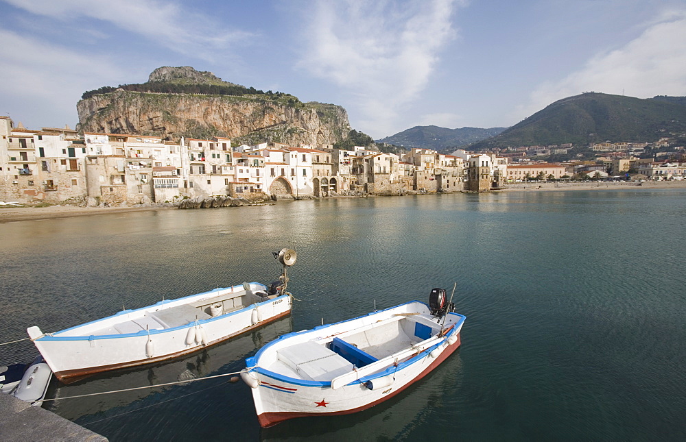 Traditional fishing boats and fishermens houses, Cefalu, Sicily, Italy, Europe