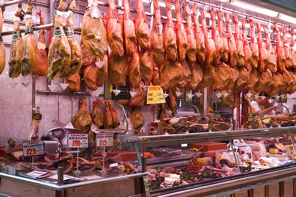 Cured dried hams for sale, Mercado Central (Central Market), Valencia, Mediterranean, Costa del Azahar, Spain, Europe