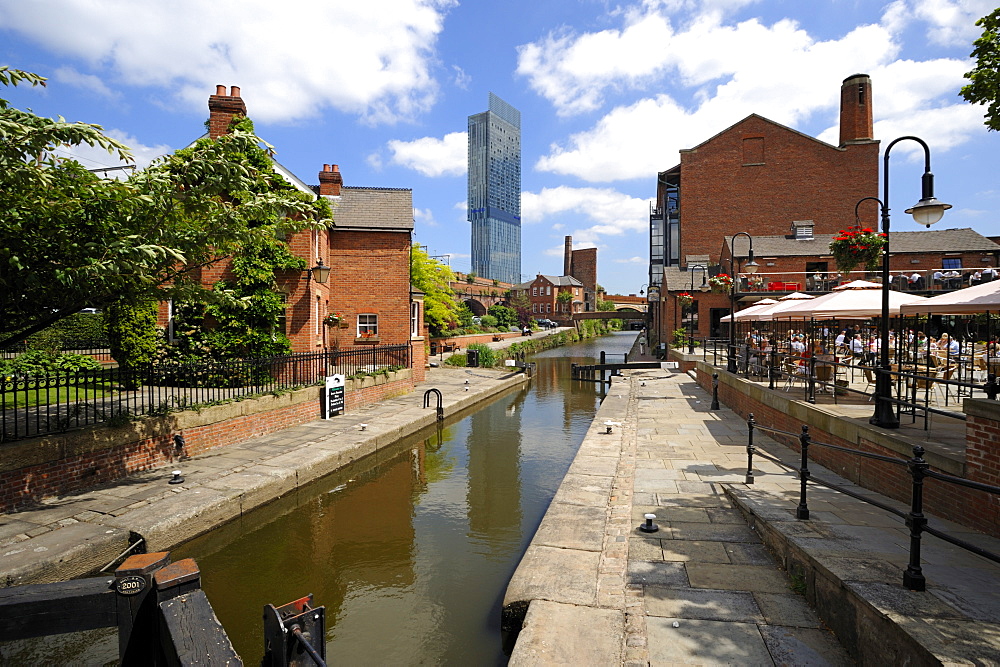 Canal and lock keepers cottage at Castlefield with the Beetham Tower in the background, Manchester, England, United Kingdom, Europe