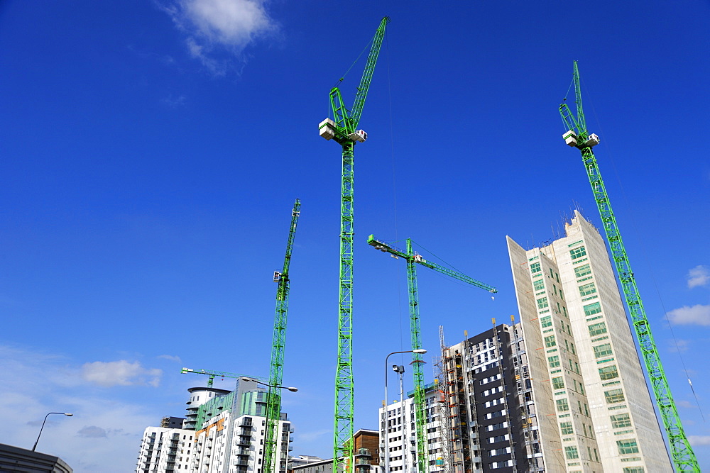 Cranes on an apartment building site, Manchester, England, United Kingdom, Europe