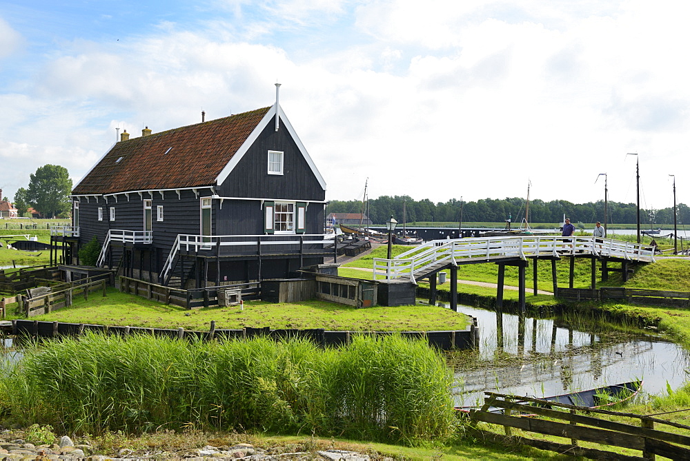 Canal and traditional building, Zuiderzee Open Air Museum, Lake Ijssel, Enkhuizen, North Holland, Netherlands, Europe