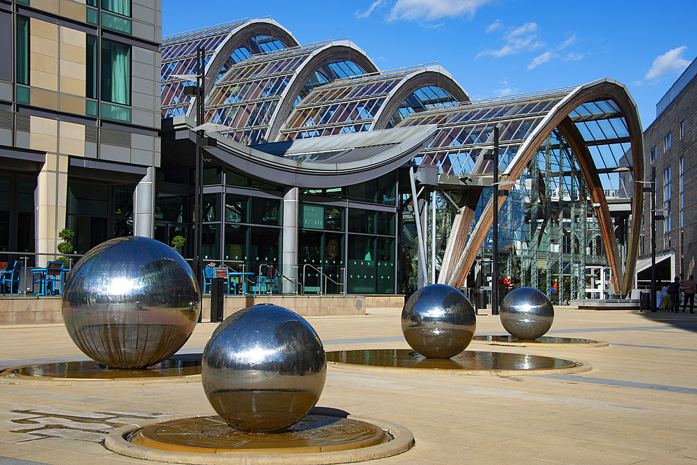 Steel Balls, with Winter Gardens behind, Millenium Square, Heart of the City, Sheffield, Yorkshire, England