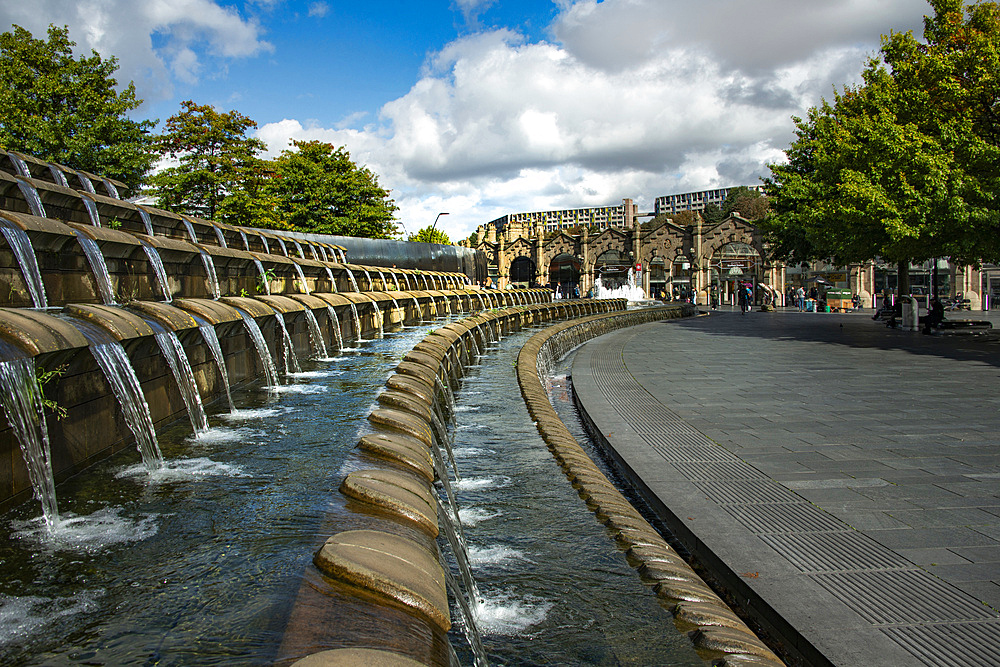 The 'Cutting Edge' steel wall and cascading water features outside Sheffield railway station which form 'Sheffield Gateway' entrance to the city. The design pays homaage to 'Steel City's' invention of stainless steel and the water that powered the industy