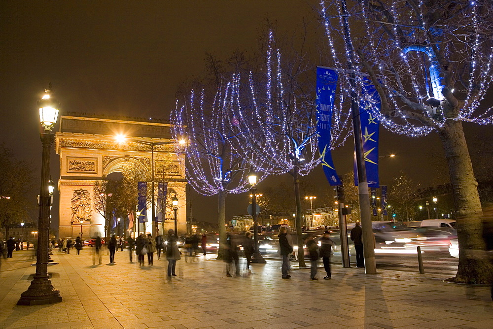 Christmas lights and the Arc de Triomphe, Paris, France, Europe