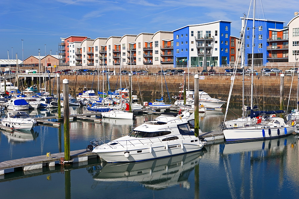 Waterfront apartments and luxury yachts in Albert Marina, St. Helier, Jersey, Channel Islands, United Kingdom, Europe