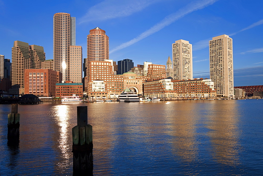 Skyline and inner harbour including Rowes Wharf at dawn, Boston, Massachusetts, New England, United States of America, North America