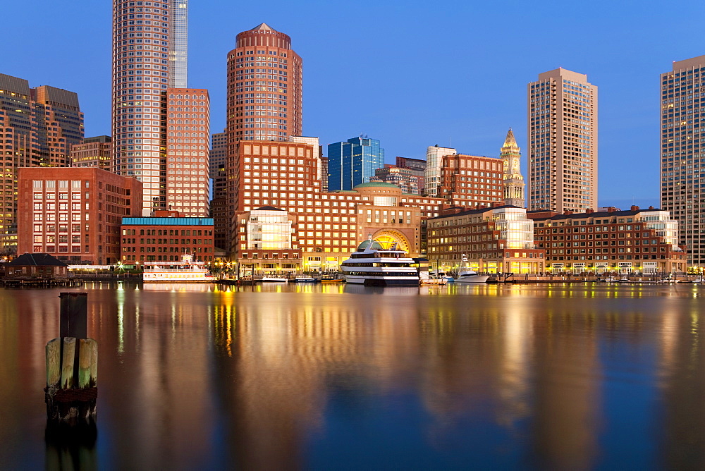 Skyline and inner harbour including Rowes Wharf at dawn, Boston, Massachusetts, New England, United States of America, North America