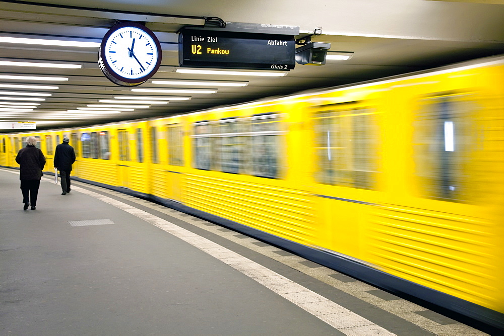 Moving train pulling into modern subway station, Berlin, Germany, Europe