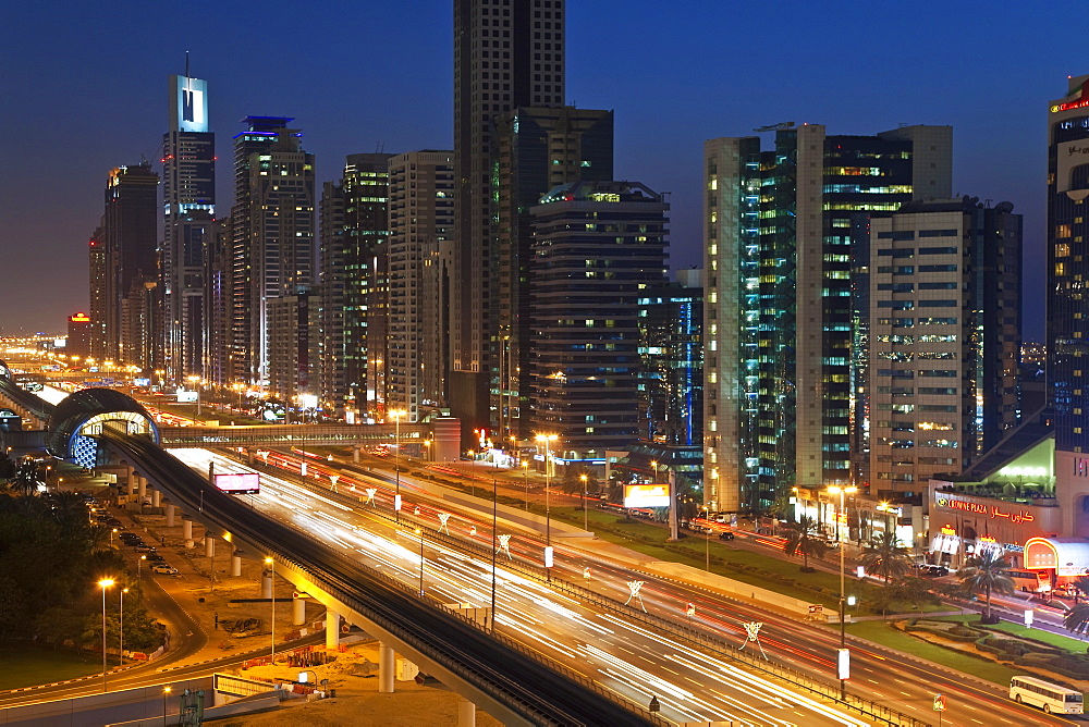 Elevated view over the modern skyscrapers along Sheikh Zayed Road looking towards the Burj Kalifa, Dubai, United Arab Emirates, Middle East