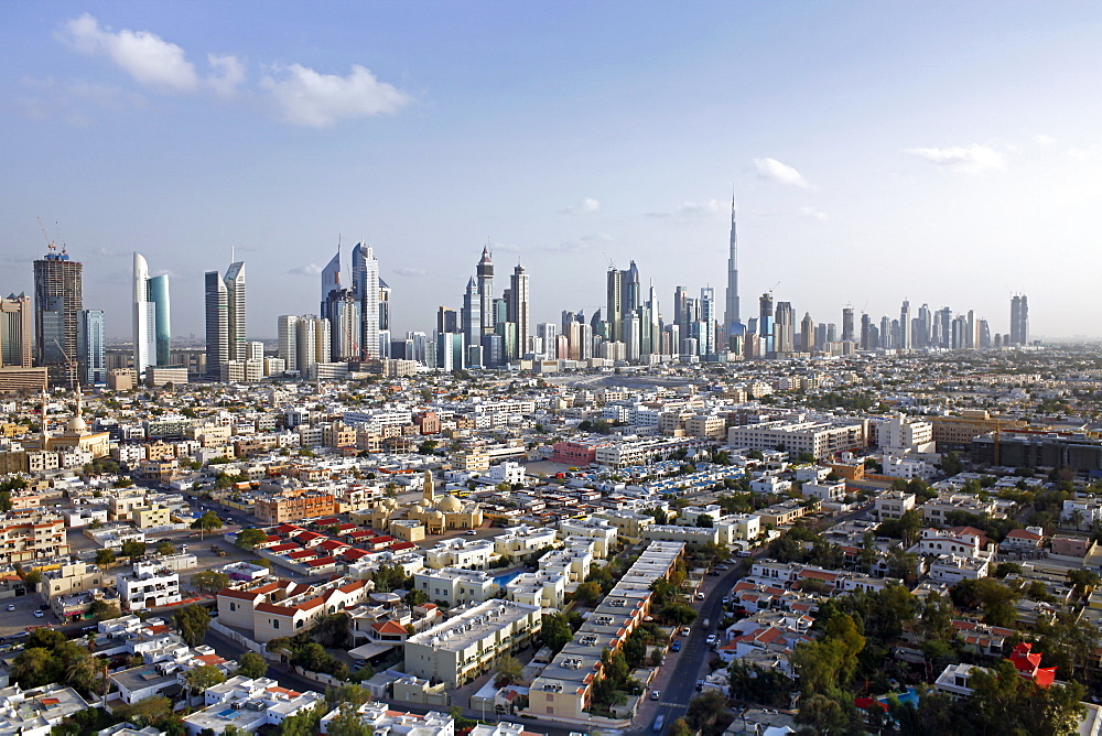 Elevated view of the new Dubai skyline of modern architecture and skyscrapers including the Burj Khalifa on Sheikh Zayed Road, Dubai, United Arab Emirates, Middle East