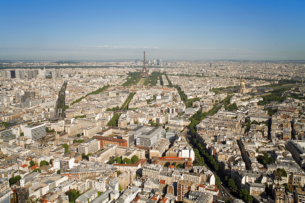 View of city with the Eiffel Tower in distance, from the Tour Montparnasse, Paris, France, Europe