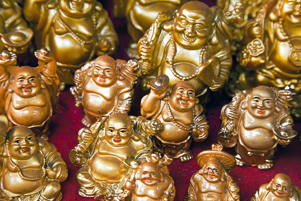 Mini Buddha figures for sale in a shop in Mumbai, India, Asia