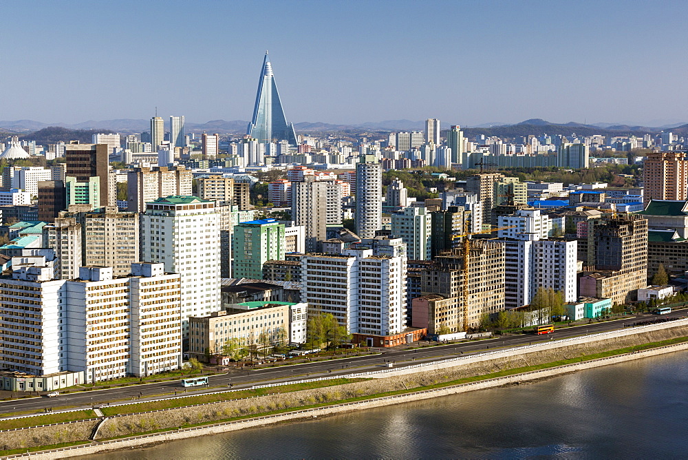 Elevated city skyline including the Ryugyong hotel and Taedong River, Pyongyang, Democratic People's Republic of Korea (DPRK), North Korea, Asia