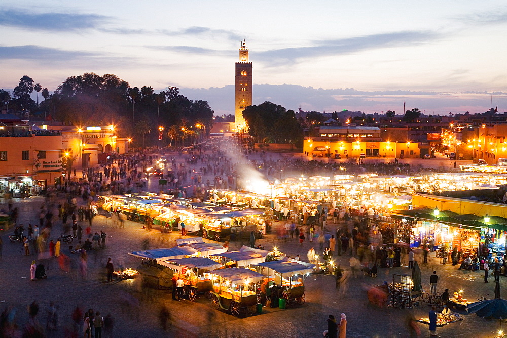 Elevated view of the Koutoubia Mosque at dusk from Djemaa el-Fna, Marrakech, Morocco, North Africa, Africa 