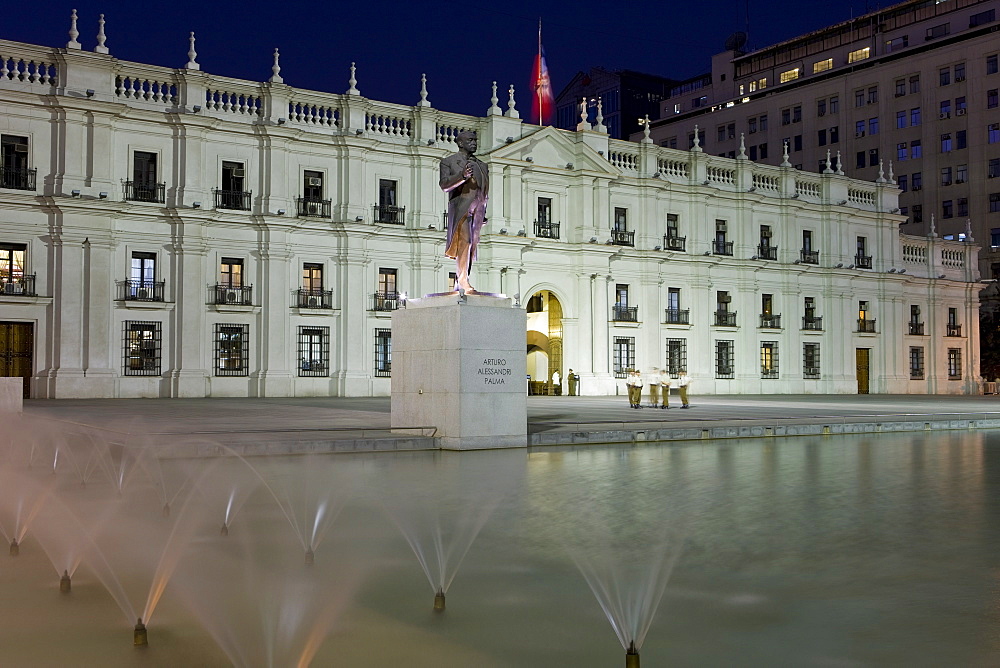 Palacio de la Moneda, Chile's presidential palace illuminated at dusk, Santiago, Chile, South America