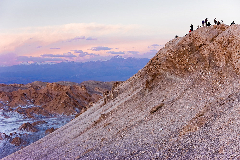 Tourists waiting to watch the full moon rise over the Valle de la Luna (Valley of the Moon), Atacama Desert, Norte Grande, Chile, South America