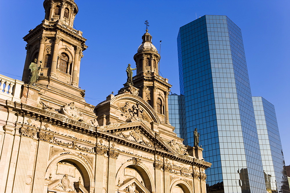 Cathedral Metropolitana and modern office building in Plaza de Armas, Santiago, Chile, South America