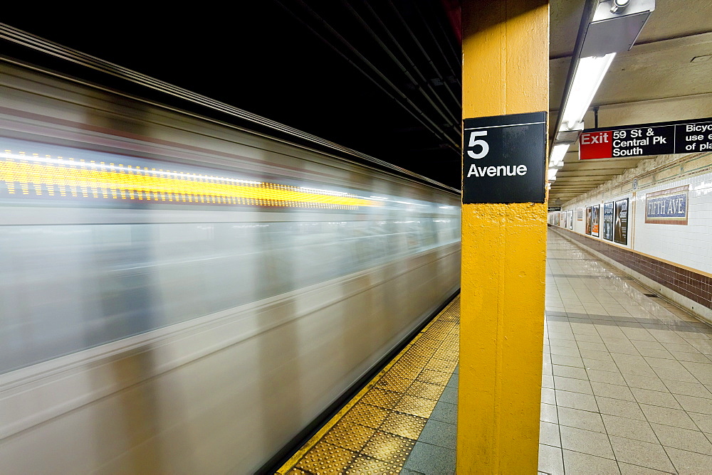 Subway station and train in motion, Manhattan, New York City, New York, United States of America, North America