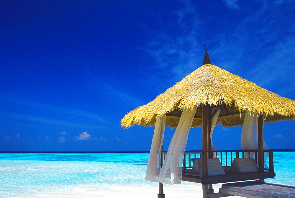 Jetty with straw roof, Maldives, Indian Ocean, Asia