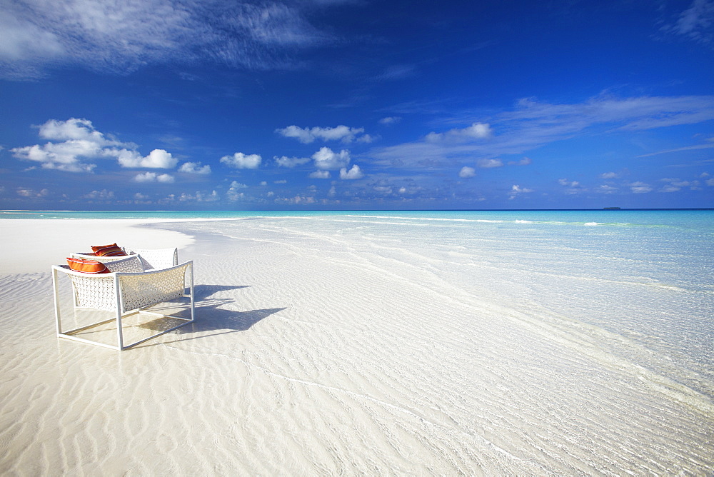 Deck chairs on tropical beach, Maldives, Indian Ocean, Asia