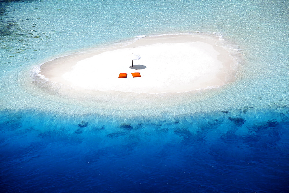 Aerial view of a sandbank, pillows and sun umbrella , Maldives, Indian Ocean, Asia