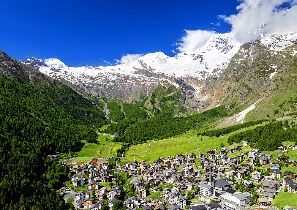 Aerial by drone of Saas-Fee village, Valais Canton, Switzerland, Europe