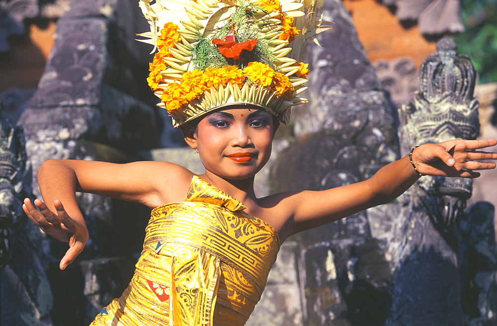 Legong dancer in action smiling, Bali, Indonesia, Southeast Asia, Asia