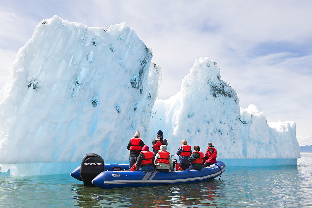 Exploring an iceberg in LeConte Bay, Southeast Alaska, United States of America, North America