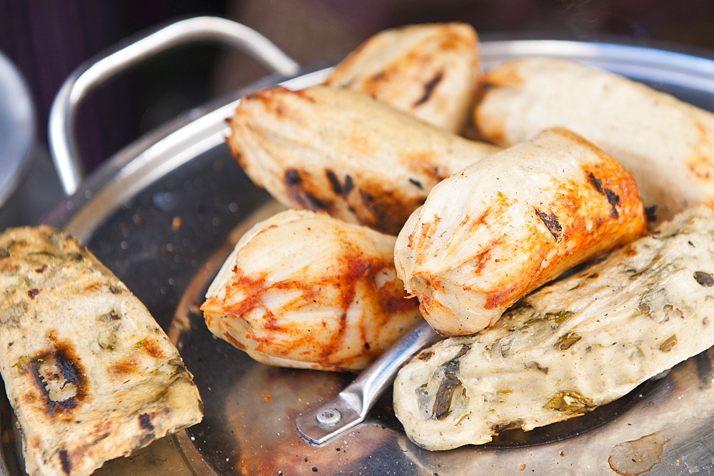 Tamales in outdoor market in Chichicastenango, Guatemala, Central America