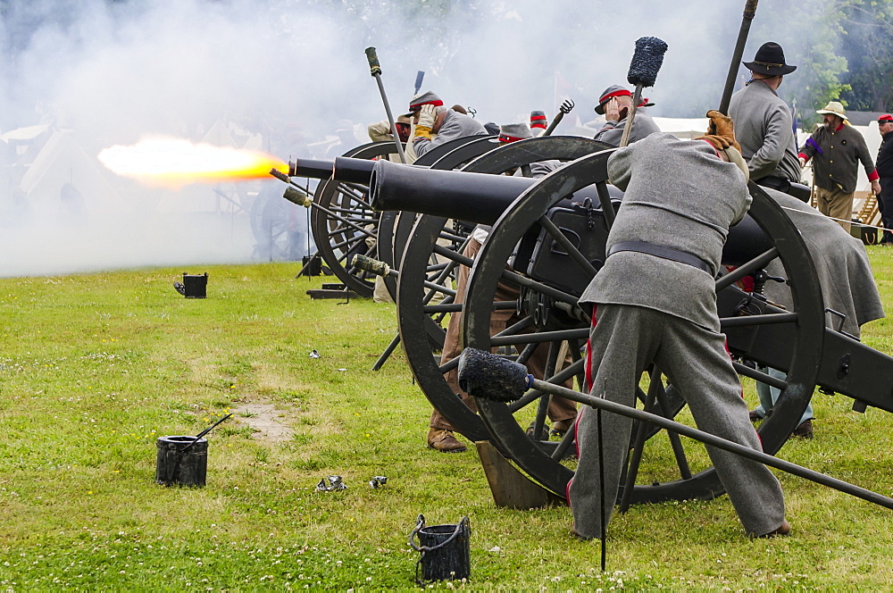 Confederate artillery unit cannon action during Thunder on the Roanoke Civil War reenactment in Plymouth, North Carolina, United States of America, North America