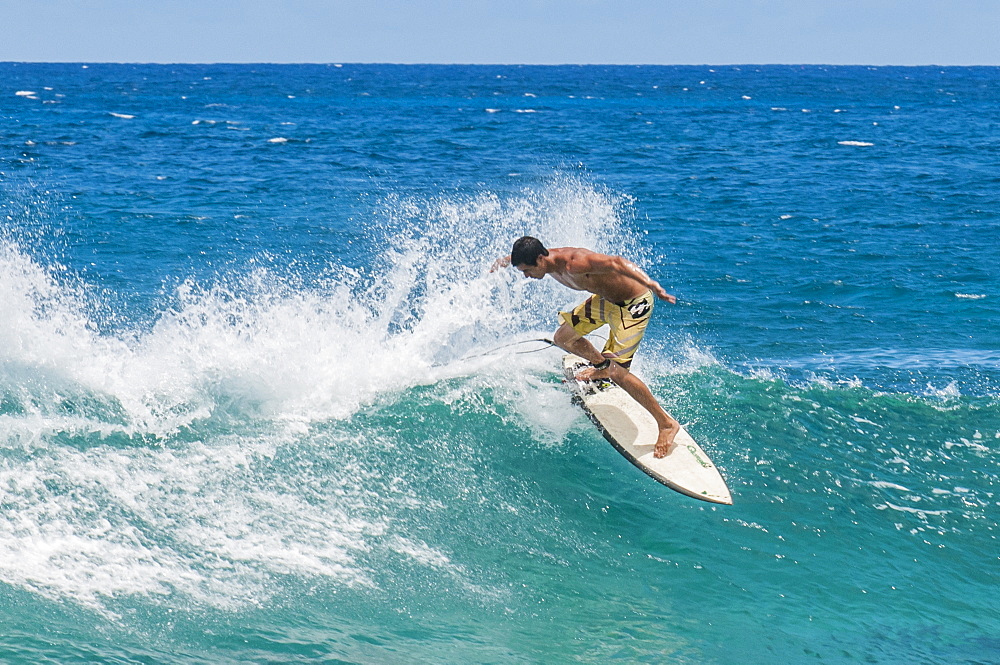 Surfing at Sunset Beach, North Shore, Oahu, Hawaii, United States of America, Pacific