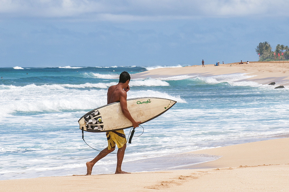 Surfing at Sunset Beach, North Shore, Oahu, Hawaii, United States of America, Pacific