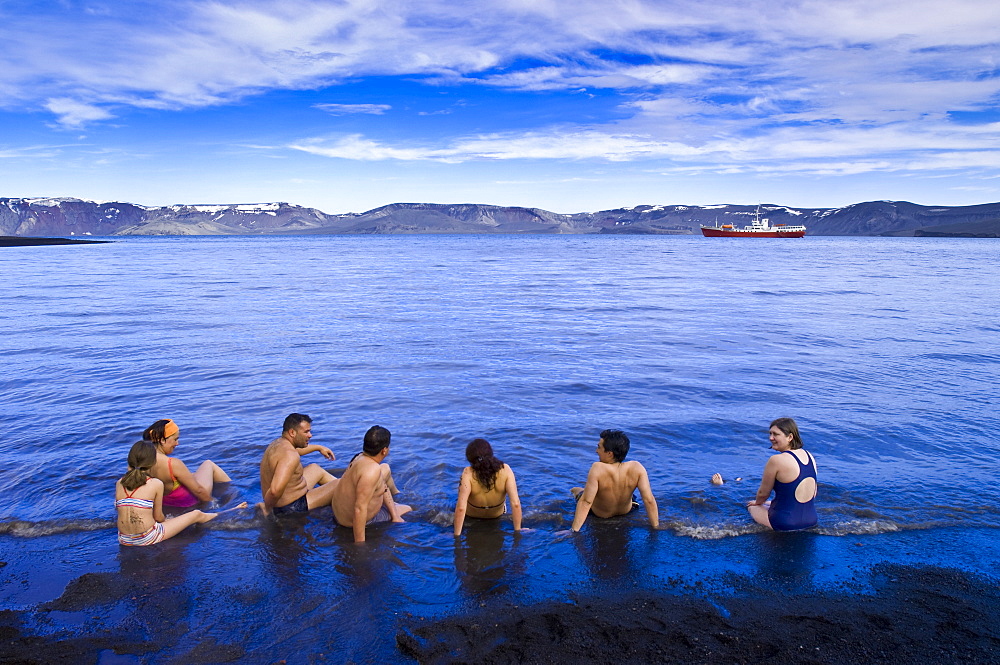 Bathing in the hot springs, Pendulum Cove, Deception Island, Antarctica, Polar Regions