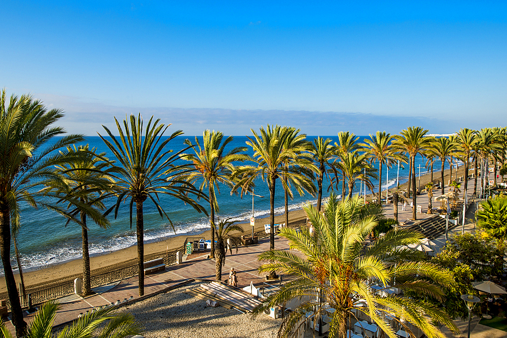 The Paseo Maritimo De Marbella promenade on Playa de la Fontanilla beach, Marbella, Costa del Sol, Andalusia, Spain, Europe