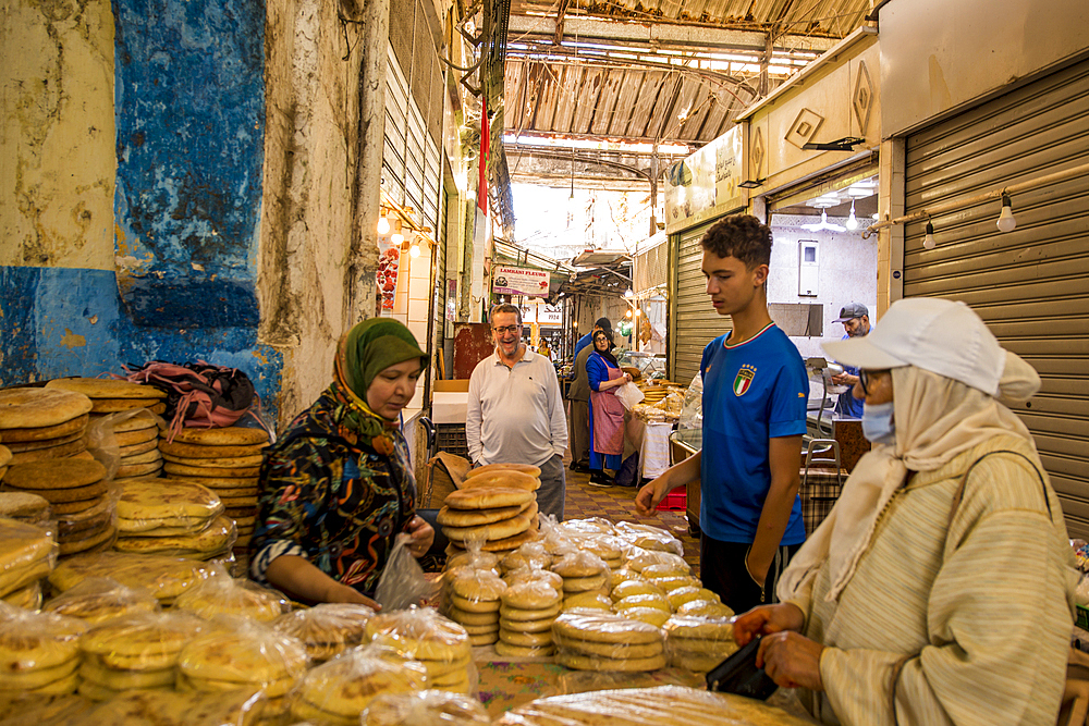 Khobz bread vendor in the main produce market in Place Petit Socco district (Souk Dakhel), old Medina, Tangier, Morocco, North Africa, Africa