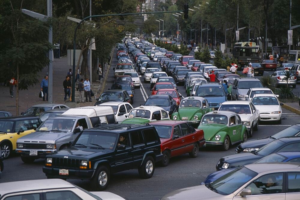 MEXICO  Mexico City Traffic congestion on Paseo de La Reforma  long tailback of cars and taxis.   traffic jam gridlock