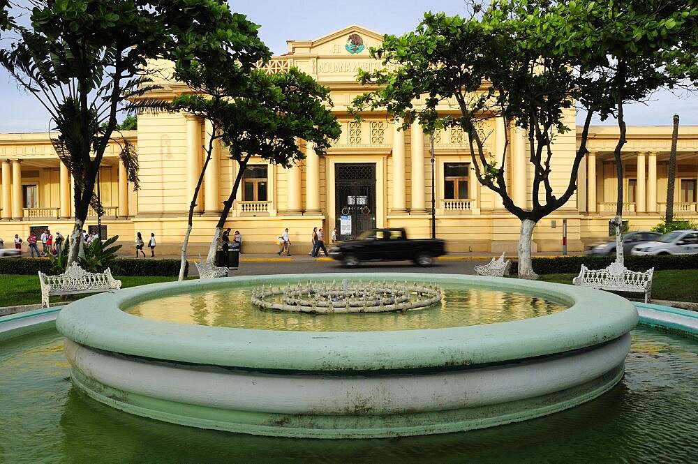 Mexico, Veracruz, Circular fountain in foreground of the Customs House.