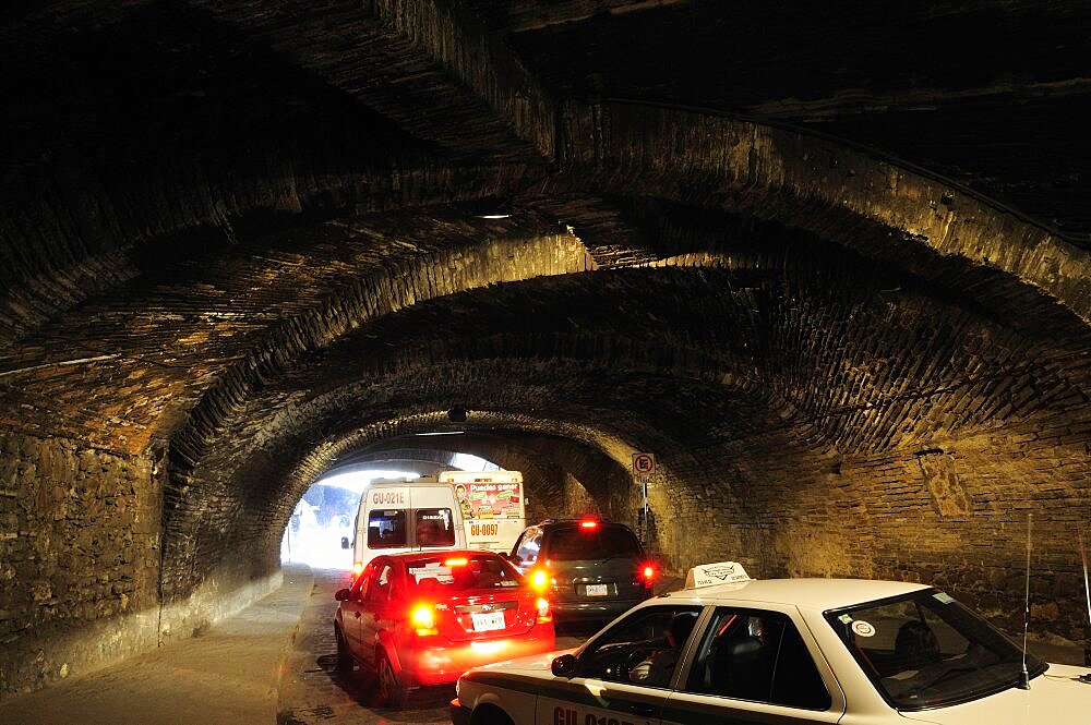 Mexico, Bajio, Guanajuato, Subterranean road with vehicles.