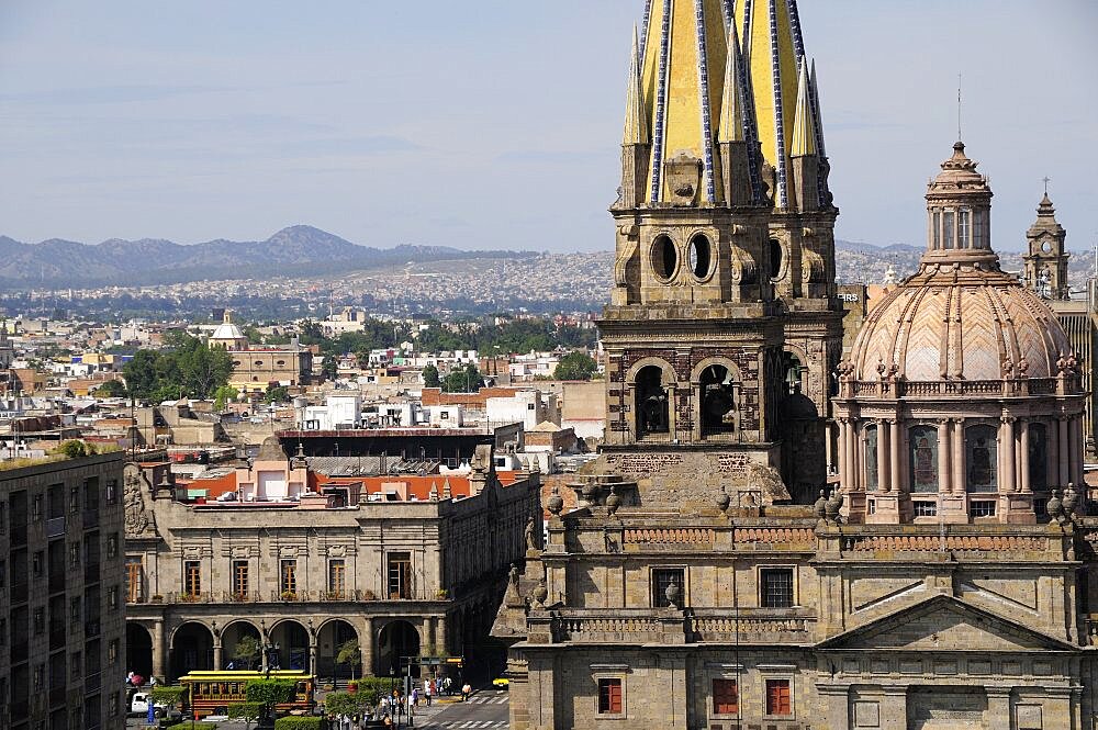 Mexico, Jalisco,  Guadalajara, View of Cathedral dome and twin spires with city to the north and Plaza Guadalajara in near distance.