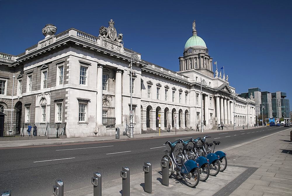 Ireland, Dublin, The Custom House with some Dublin bikes for hire.