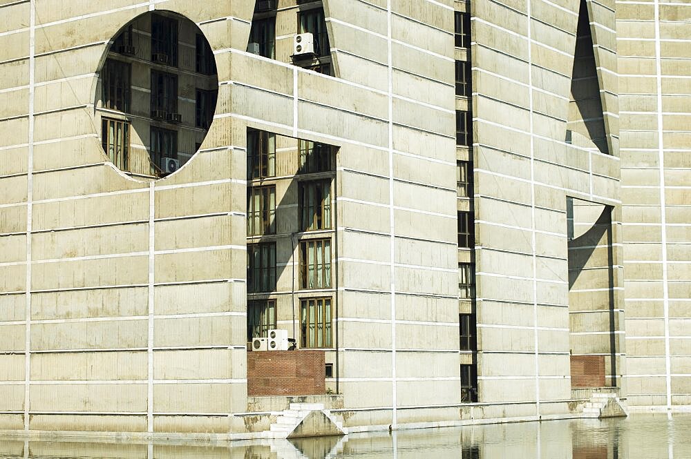 Bangladesh, Dhaka, National Assembly building designed by Louis Kahn using innovative concrete and geometric design.