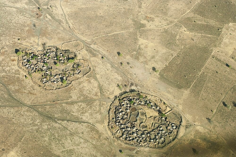 Uganda, Karamoja, Aerial views down on a traditional manyatta cattle korral.