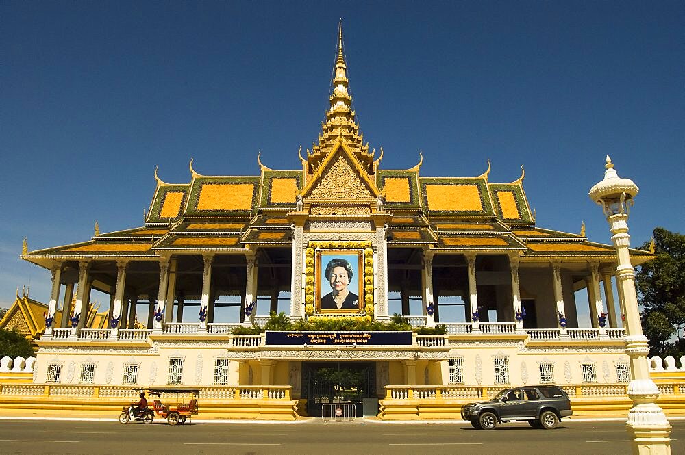 Cambodia, Phnom Penh, Queen Mother portrait at entrance to Royal palace.