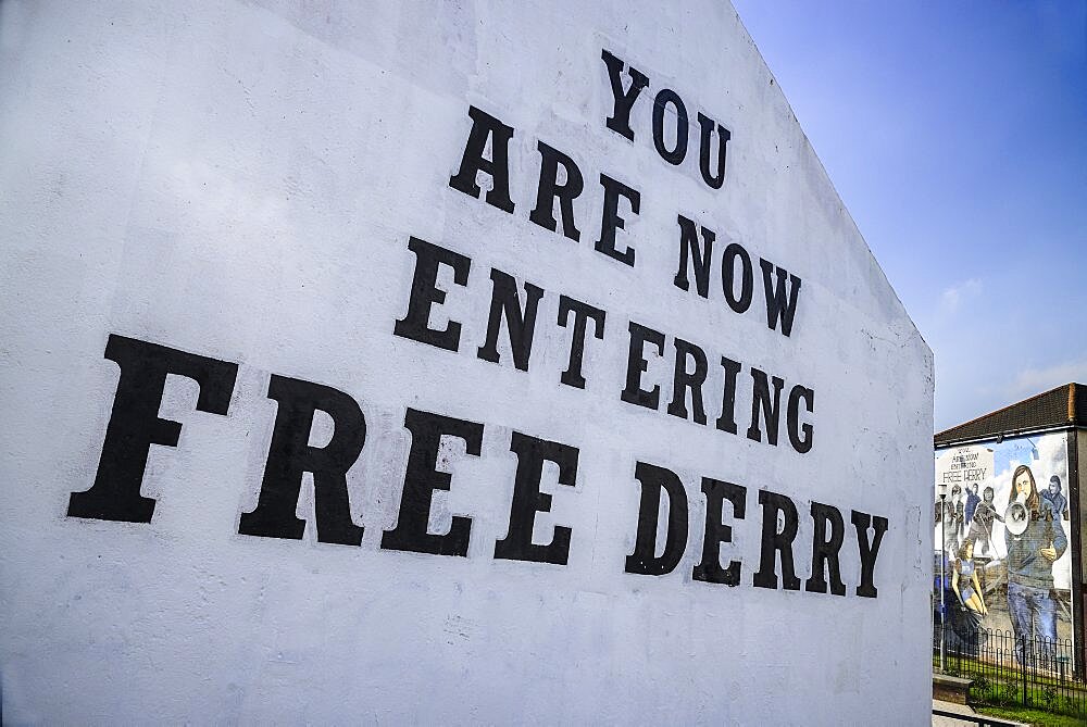 Ireland, North, Derry, Bogside Nationalist mural 'You Are Now Entering Free Derry' on old gable wall.